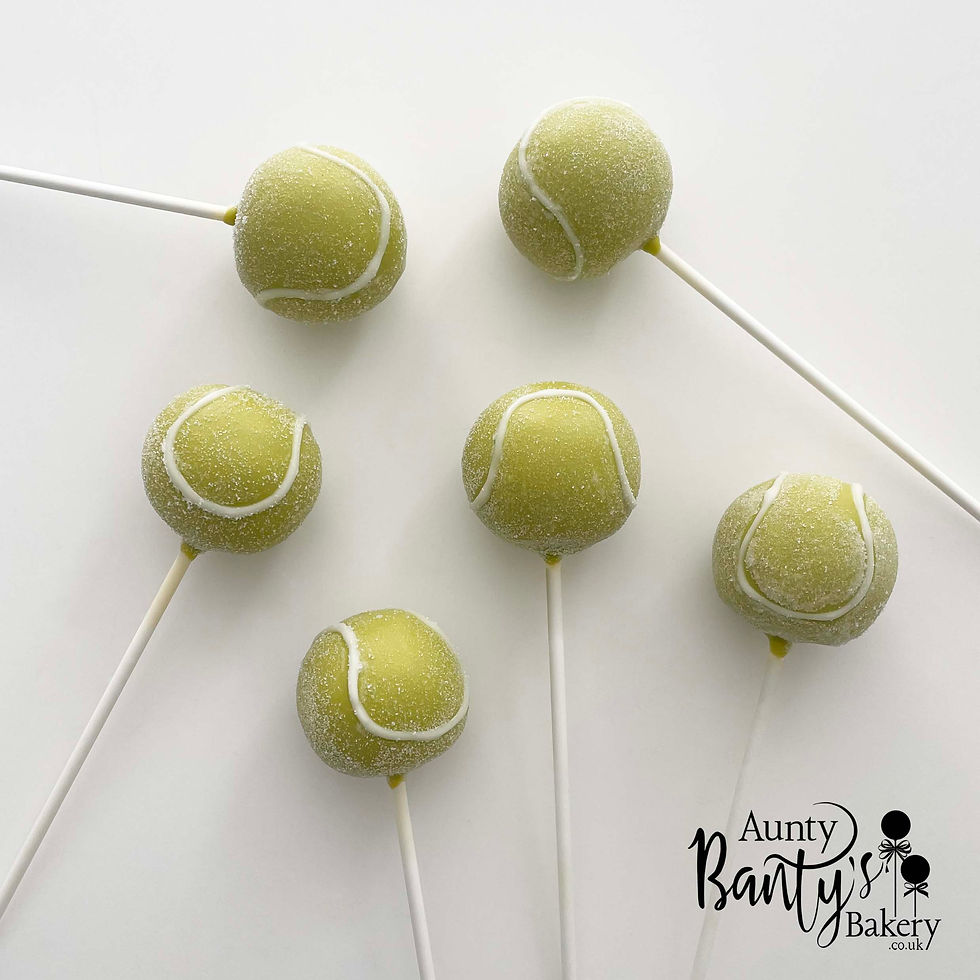 Tennis ball cake pops coated in a vibrant lime green-yellow chocolate, with the iconic white tennis-ball pattern.