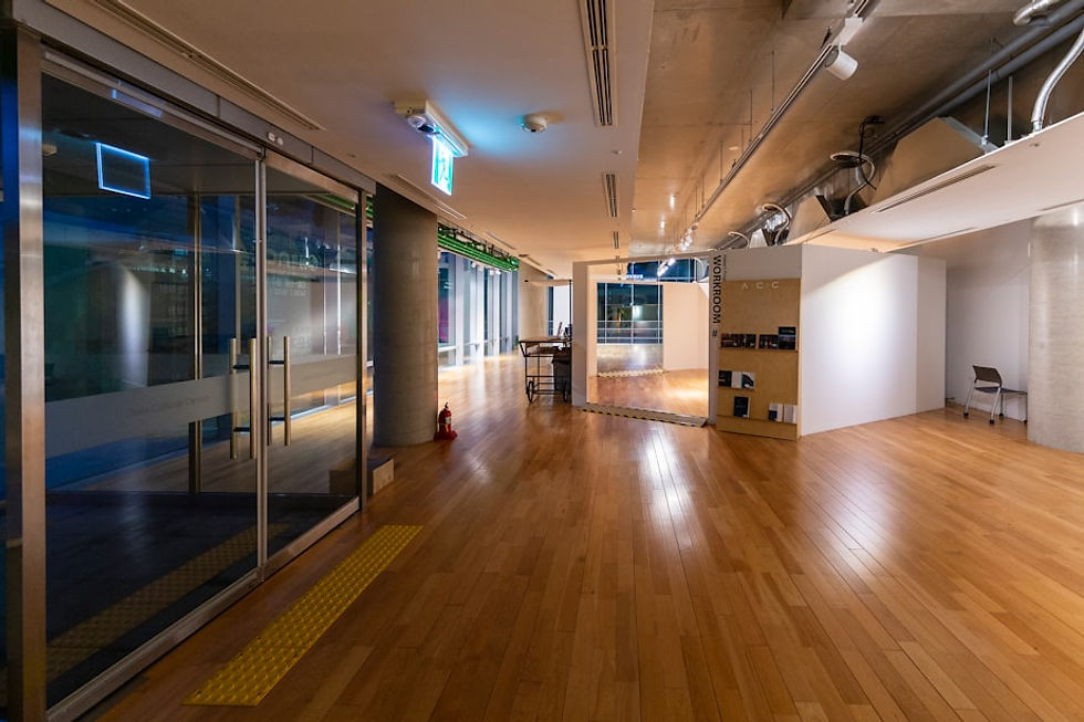 brown wooden floor with white wall