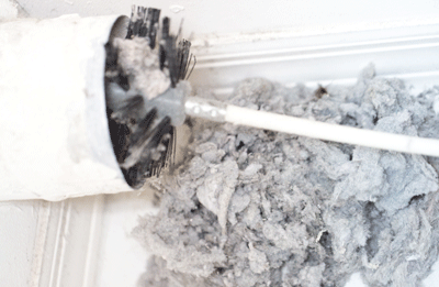 Clogged dryer vent before professional cleaning