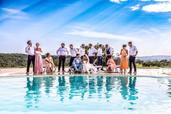 wedding party round the pool at essendrias