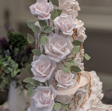 Floral wedding cakes, sugar flower wedding cakes, floral wedding cake, sugar flower wedding cake, sage green wedding cake, wedding cake, cakes by nina, cakes in Surrey, cakes in London, gold leaf floral cakes, cakes maker, unique wedding cake, wedding cakes London, wedding cakes Surrey, Wedding cakes Hampshire, bespoke wedding cakesBlush pink sugar roses, ruffle gold detailing wedding cake sugar flowers