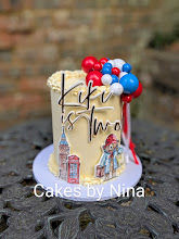 This ganache finished handpainted and hand drawn tall 6" beautiful cake