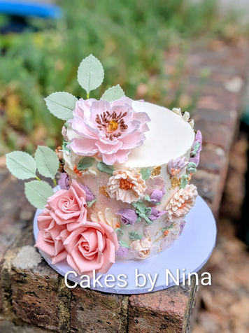 Stunning ganache finished floral wedding cake