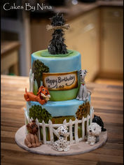 Lovely doggie cake with very scruffy one on the top with his bone