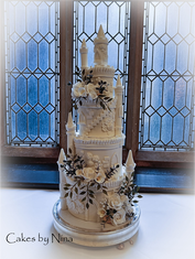 Wedding cake with floral details by Cakes by Nina
