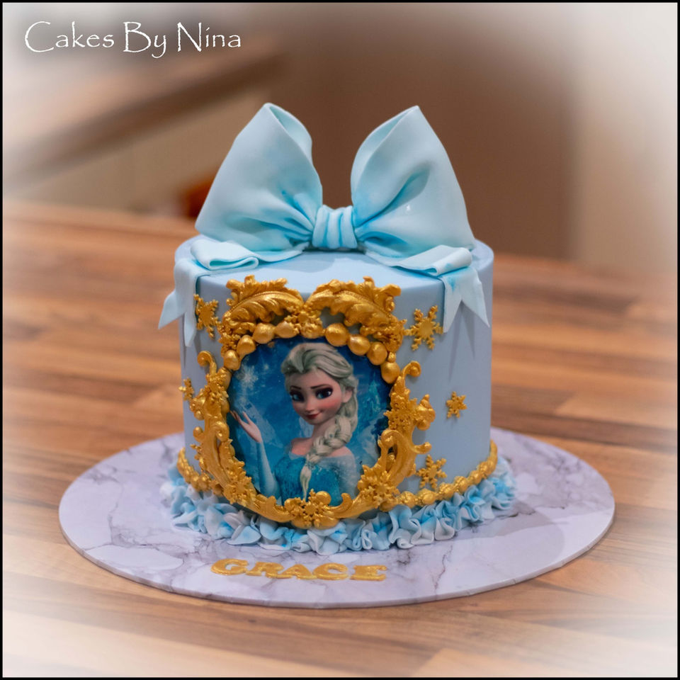 frozen cake, bow cake, gold cake, birthday cake, celebration cake, cakes by nina, baker