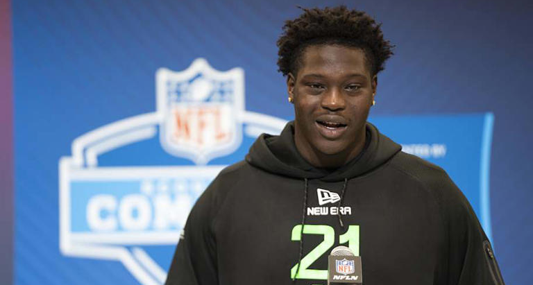 Baltimore's rookie will miss start of training camp