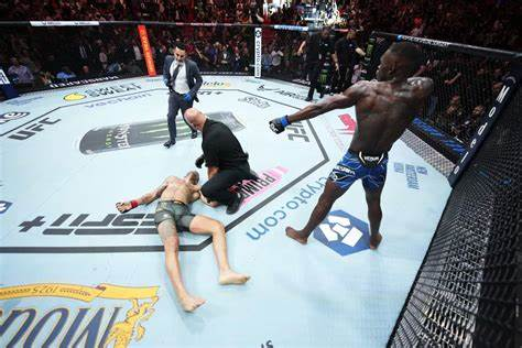 Israel Adesanya recaptures gold with thrilling KO