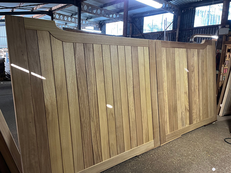 Gunstock Driveway Gates In Iroko Hardwood Front View
