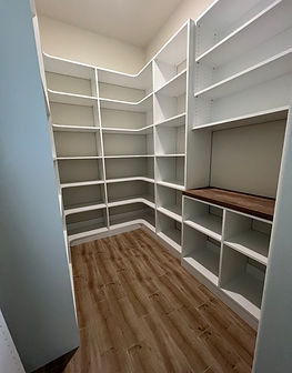 custom closet with wood floor and matching shelves central florida