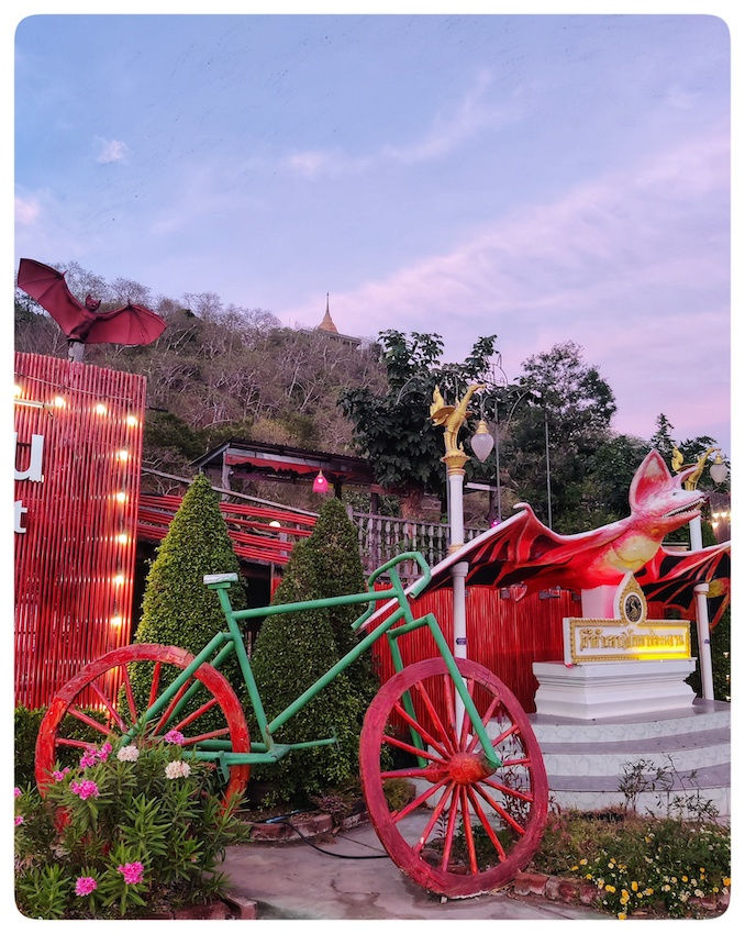 The big bat statue makes sense, but why the big bicycle??