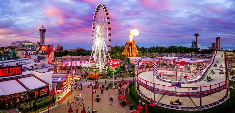 Picture of an amusement park with a flaming volcano