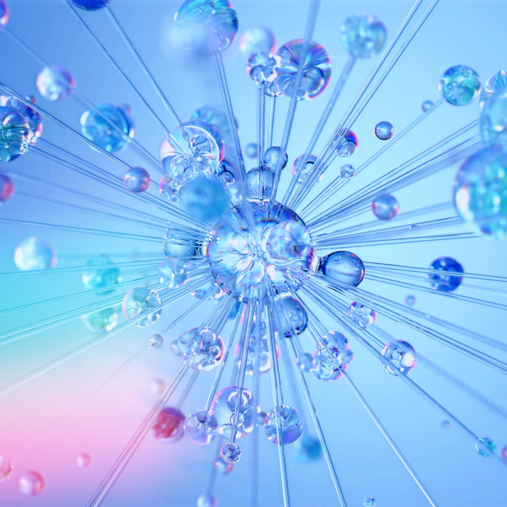 Water droplet splitting into smaller fragments that are traveling in an outward manner