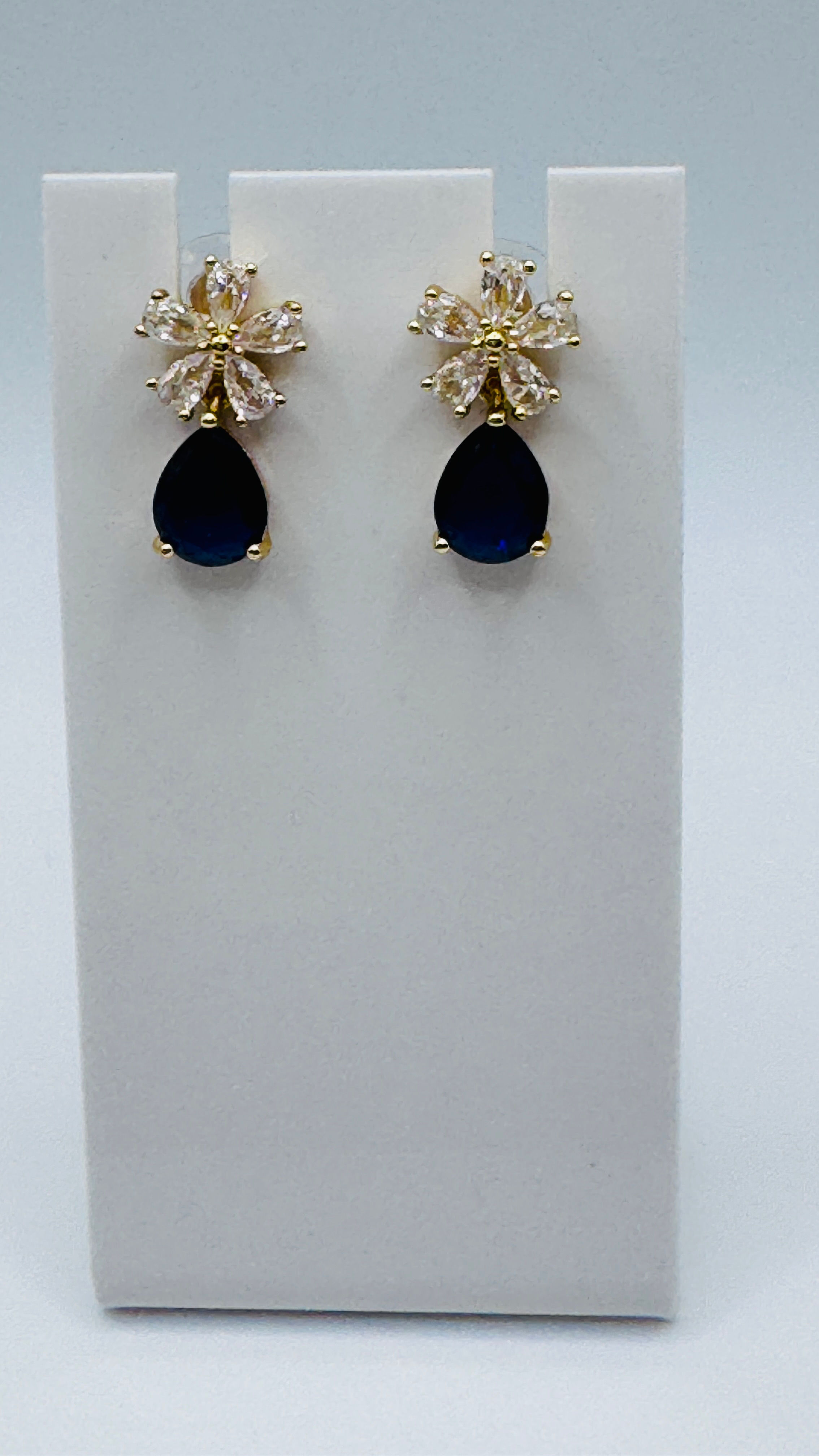 Earring Bloom with elegance in every sparkle.