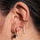 Thumbnail: Vergulde Earcuff met ketting