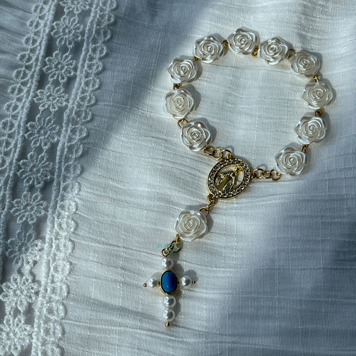 One-decade rosary with pearl flower beads and turquoise accents for Catholic prayer