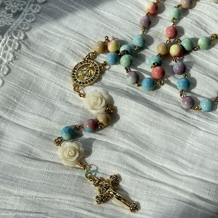 Thumbnail: Catholic 5-decade rosary inspired by Saint Thérèse of Lisieux with soft pastel tones
