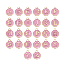 Round pink with gold initial