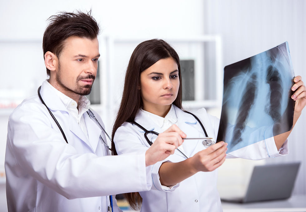 two-young-doctors-are-looking-x-ray-medical-office.jpg