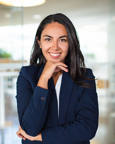 happy-businesswoman-with-hand-chin.jpg
