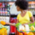 healthy-positive-happy-african-woman-holding-shopping-cart-full-fruit-vegetables_edited