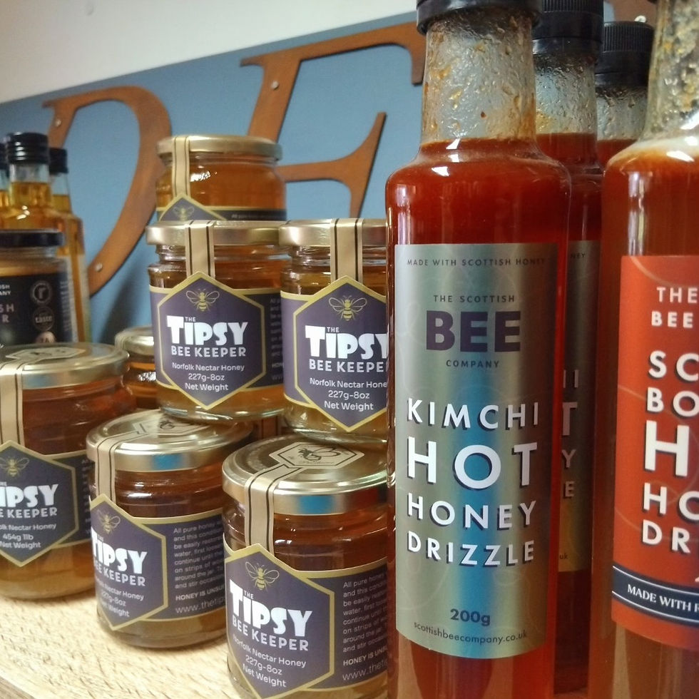 jars of honey and hot sauce linked to the food and drink section of the website