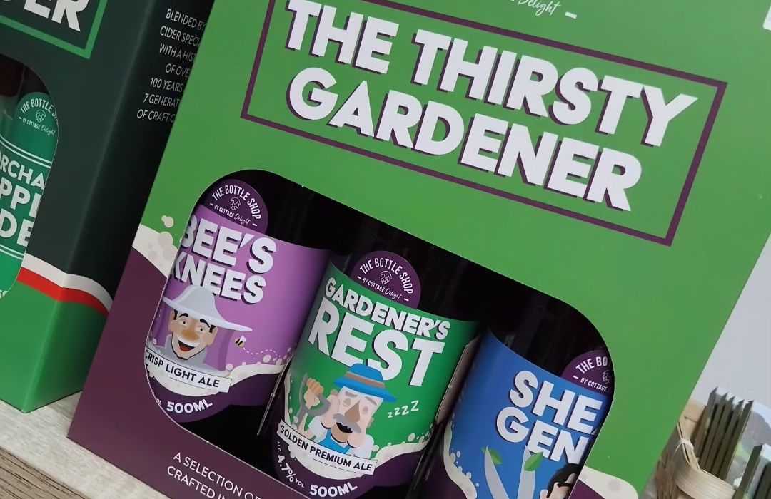 Green card box containing three bottles of real ale by The Bottle Shop