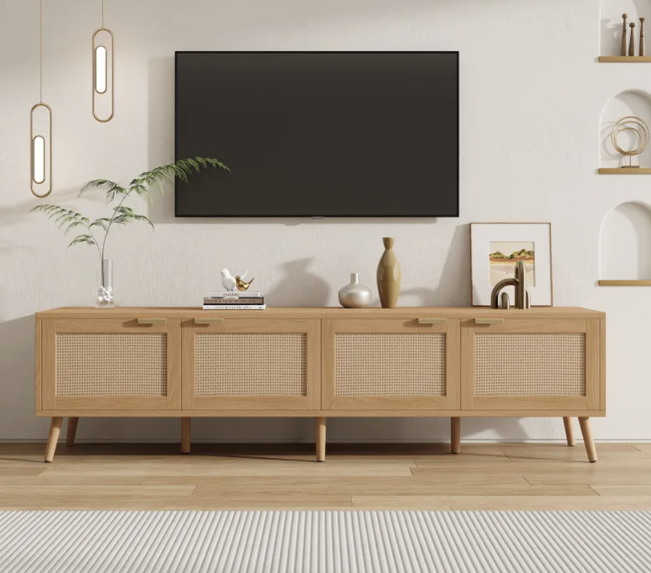 TV stand styled under a wall-mounted TV