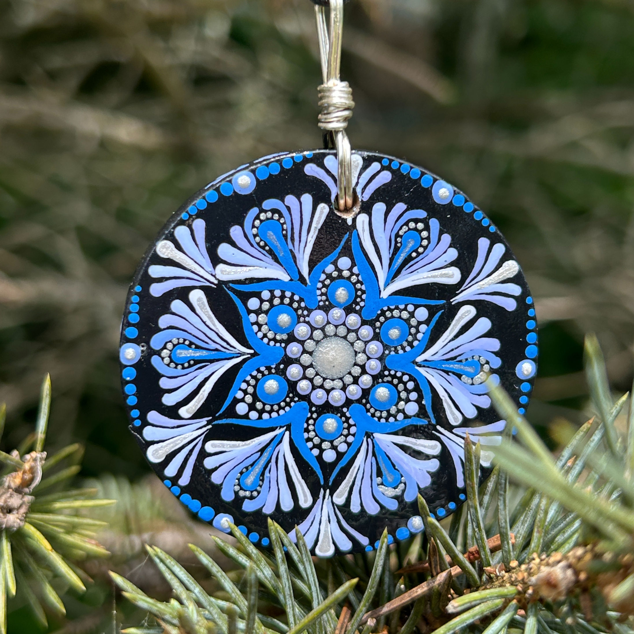 One of a kind original works of art jewelry. Handpainted dot art mandala blue jay pendant by Wicked Stones
