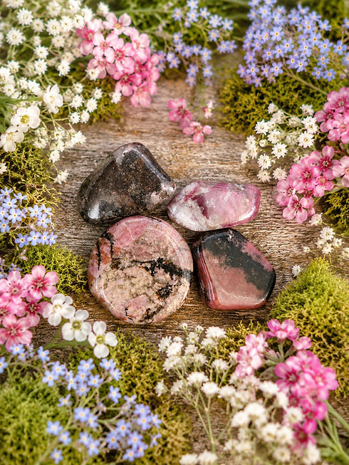 Rhodonite healing crystals for learning to love who you are in this moment and self care
