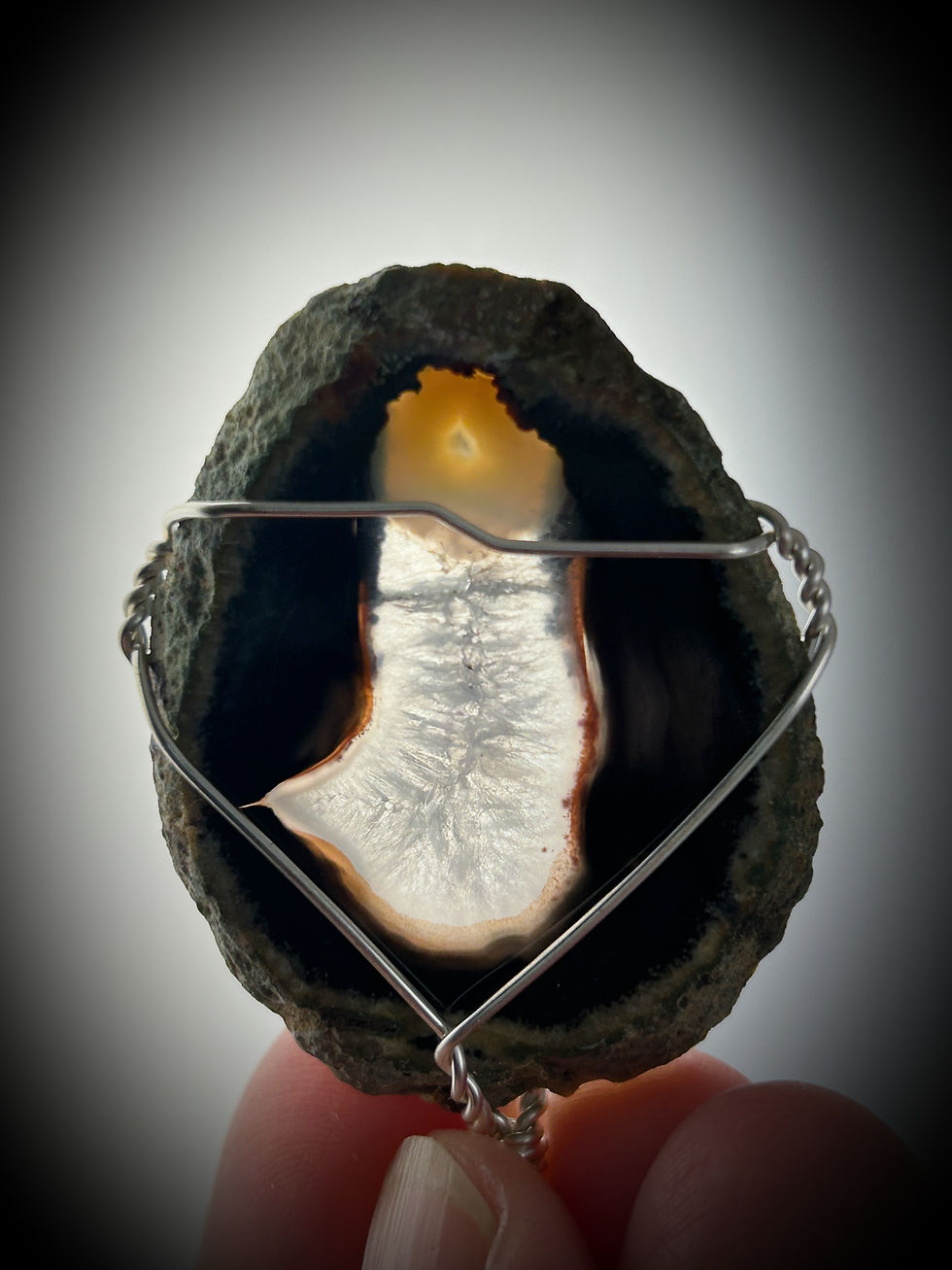 Thumbnail: A look inside of an Agate slice and the beautiful natural patterns. Jewelry of Agate made in Canada by Wicked Stones