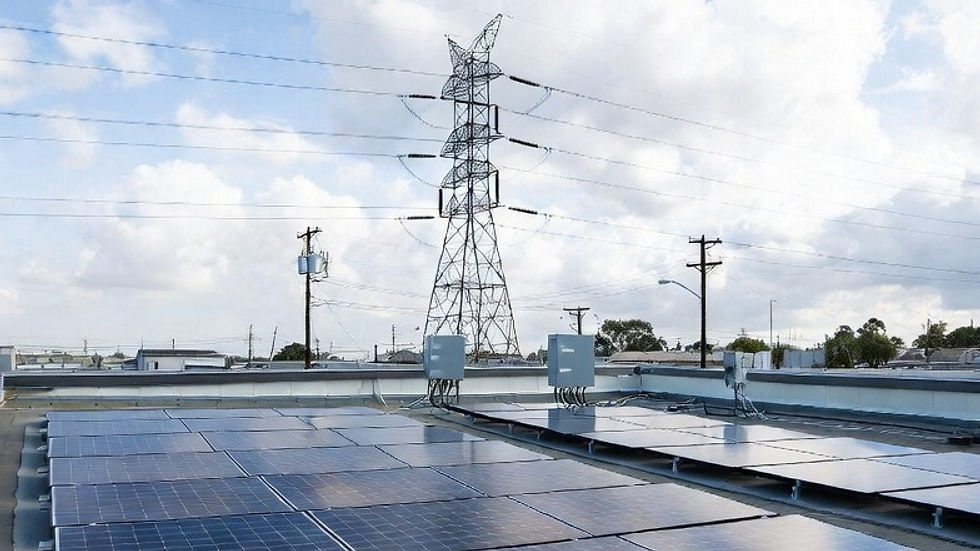 A solar array rooftop with grid lines in the background.