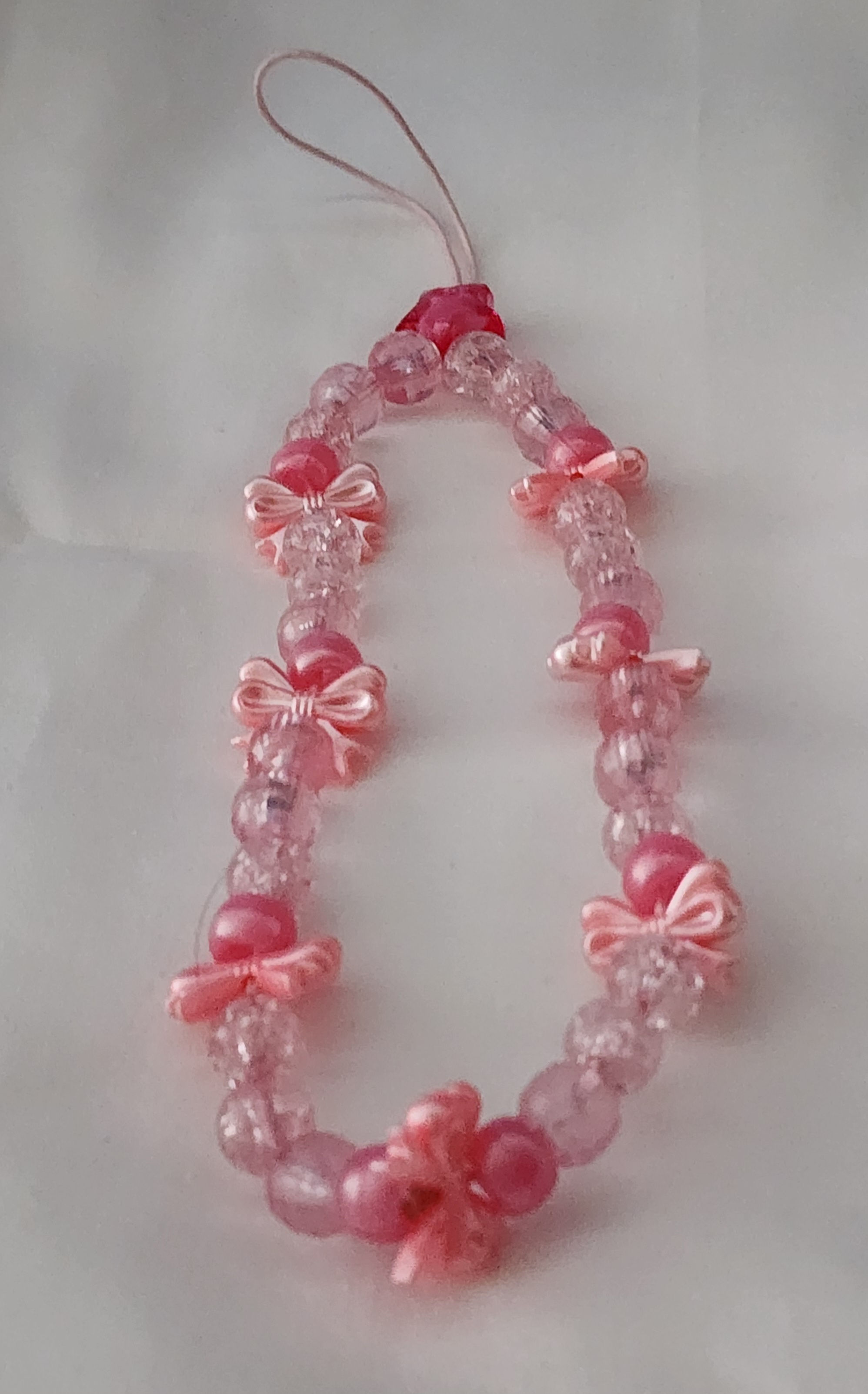 Light pink bow phone charm