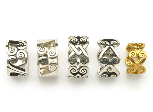 New zealand handmade art jewellery designer nelson nz gold and silver koru spiral rings