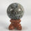 Thumbnail: Small Spheres on Wooden Stands