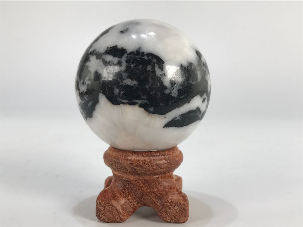 Thumbnail: Small Spheres on Wooden Stands
