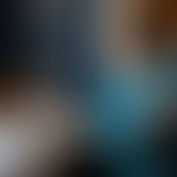 A pregnant woman sits at her kitchen table juggling her chaotic life