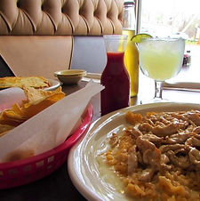 Don Chuys profile with marguerita and plate_edited.jpg