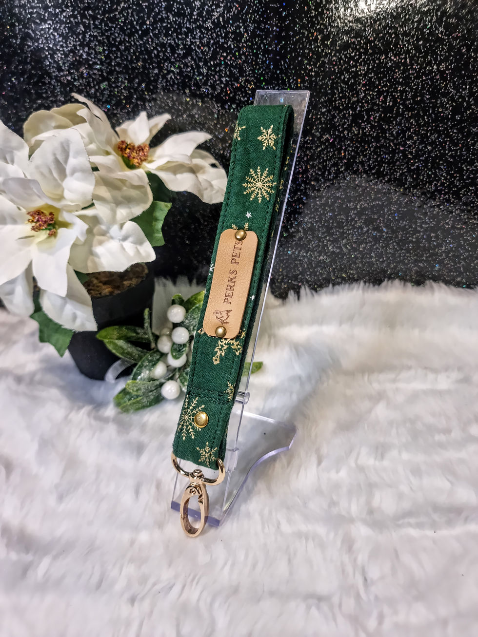 Thumbnail: Silver & Gold Snowflakes on Green Wristlet