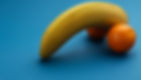 A banana and two oranges representing male private parts.