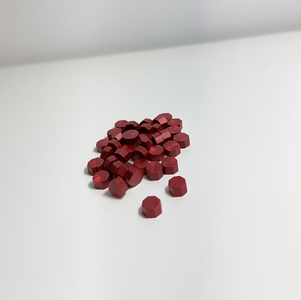 שעווה להטבעת חותמות – פתיתי שעווה אדומים (50 יח')