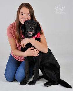 Girl_and_black_lab_dog_photo_in_studio_A