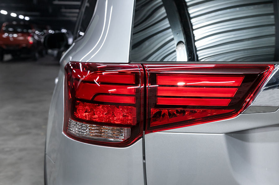 close-up-detail-one-led-red-taillight-modern-silver-crossover-car-exterior-detail-automobi