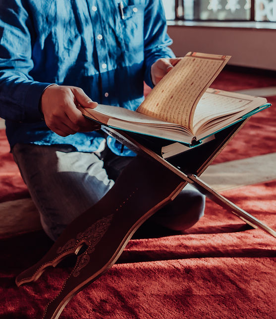 muslim-reads-holy-islamic-book-quraqn-modern-grand-mosque-muslim-holy-month-ranazan.jpg