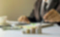 businessman-holding-pen-tree-growing-coin-planning-ideas-investing-growing-money.jpg
