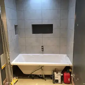 bath being fitted
