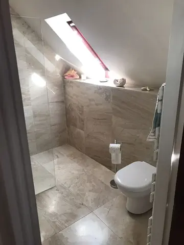 new tiles near toilet 