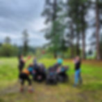 Group of moms exercising and sharing a laugh during a fun exercise.