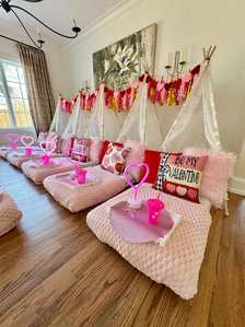 Be My Valentine sleepover setup with festive pink and red decor