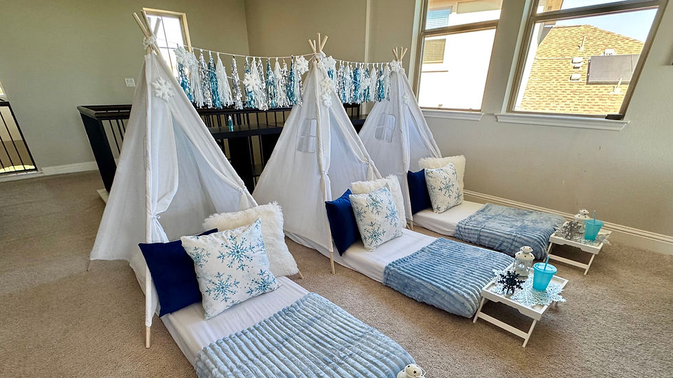 Snowflakes winter sleepover tents decorated with icy blue, silver and white details